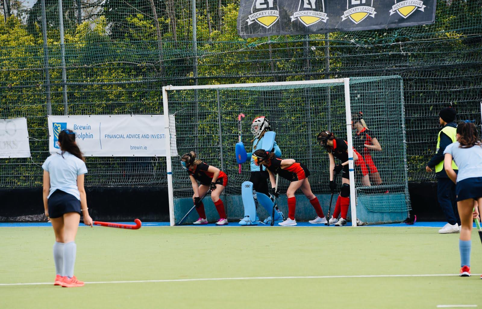 Senior Girls Hockey team defending their goal